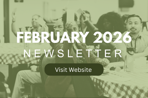 A red fire extinguisher mounted on a plain white wall for emergency safety.