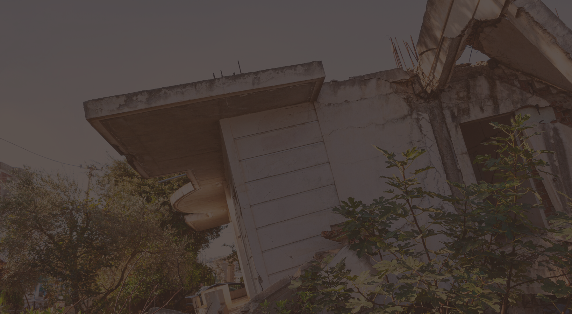 Close-up of diverse hands forming a connection, symbolizing teamwork and unity outdoors.